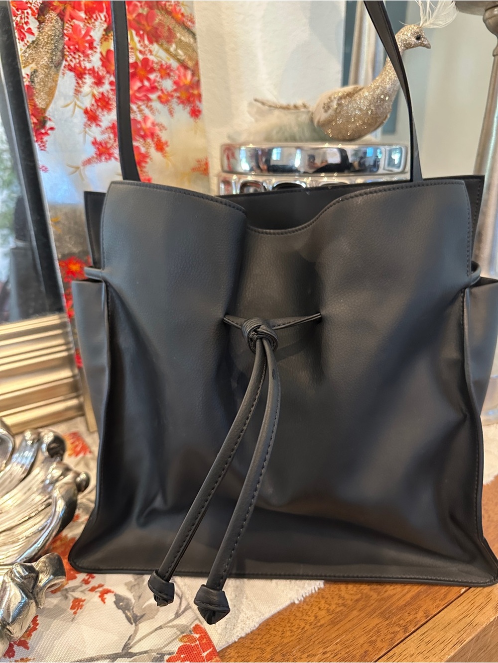 Von Holzhausen 
Minimalist Black Drawstring Shoulder Bag
